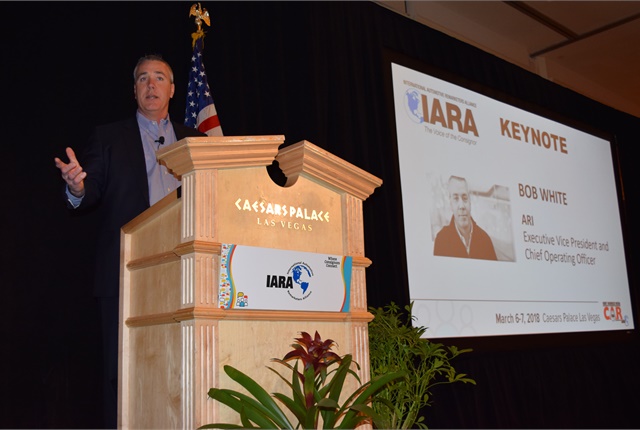 <p><em>Bob White of ARI during the IARA keynote on&nbsp;disruptions in the remarketing industry.</em></p>