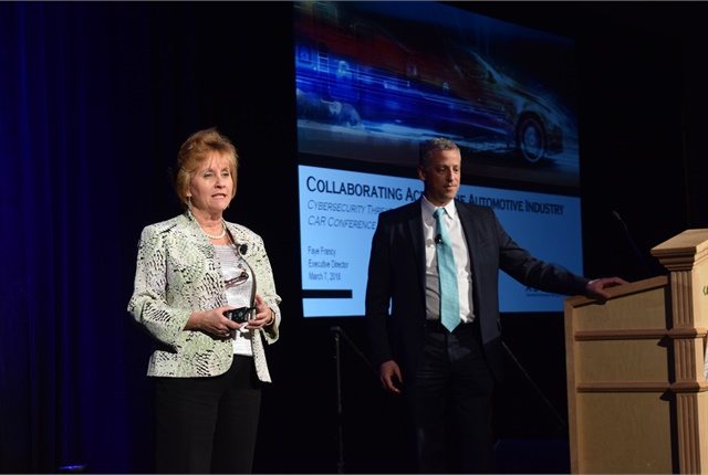 <p><em>Faye Francy (left), executive director of Auto-ISAC, and&nbsp;Andrea Amico, president of Jack Cooper Logistics, during the IARA townhall discussion on data privacy and cyber security threats to the remarketing industry.</em></p>